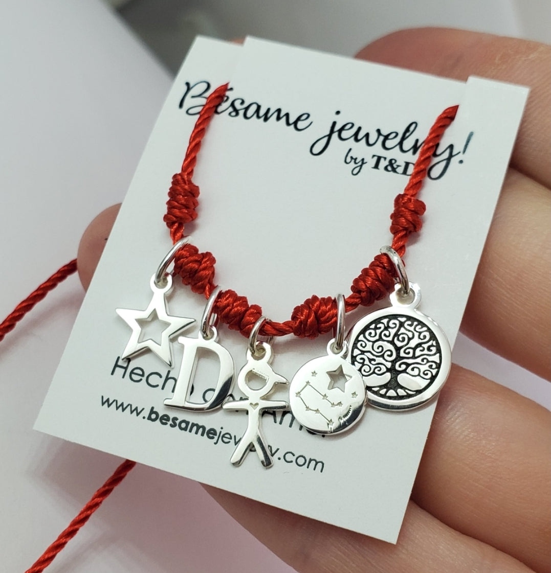 Pulsera dijes hilo rojo