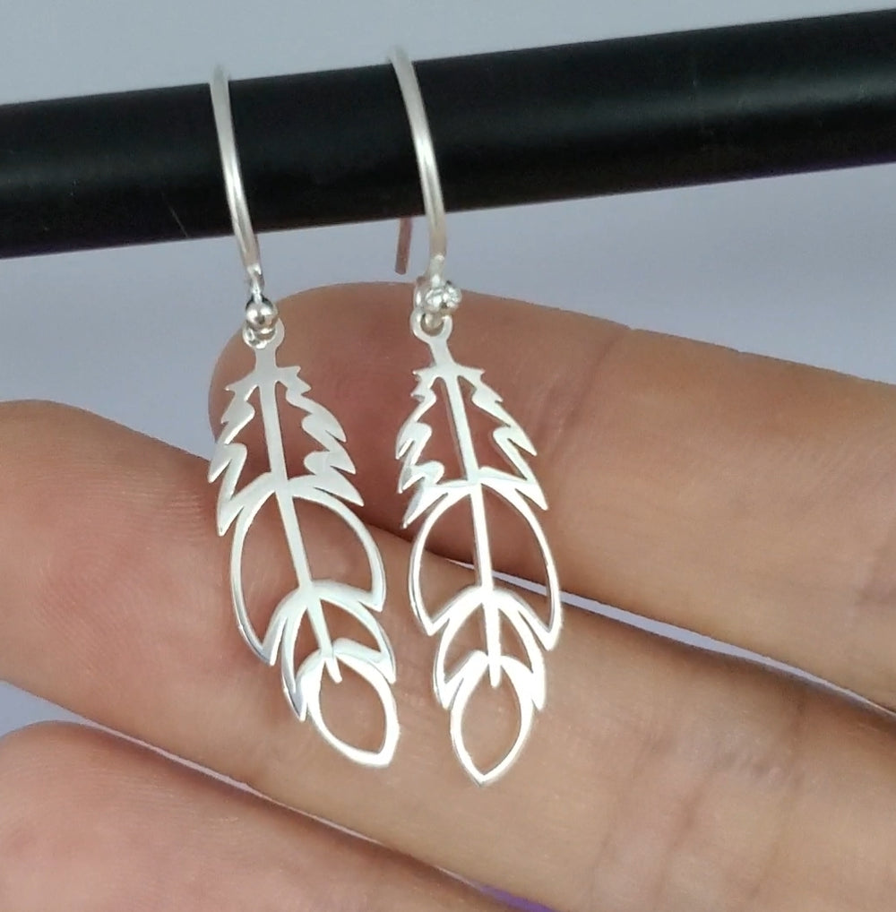 Aretes plumas
