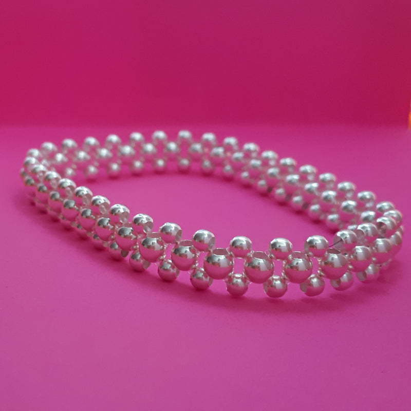 Pulsera bolitas