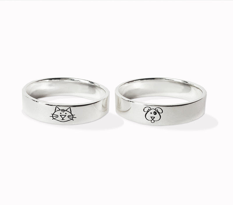 Anillo tipo Banda con perro o gato en plata .925
